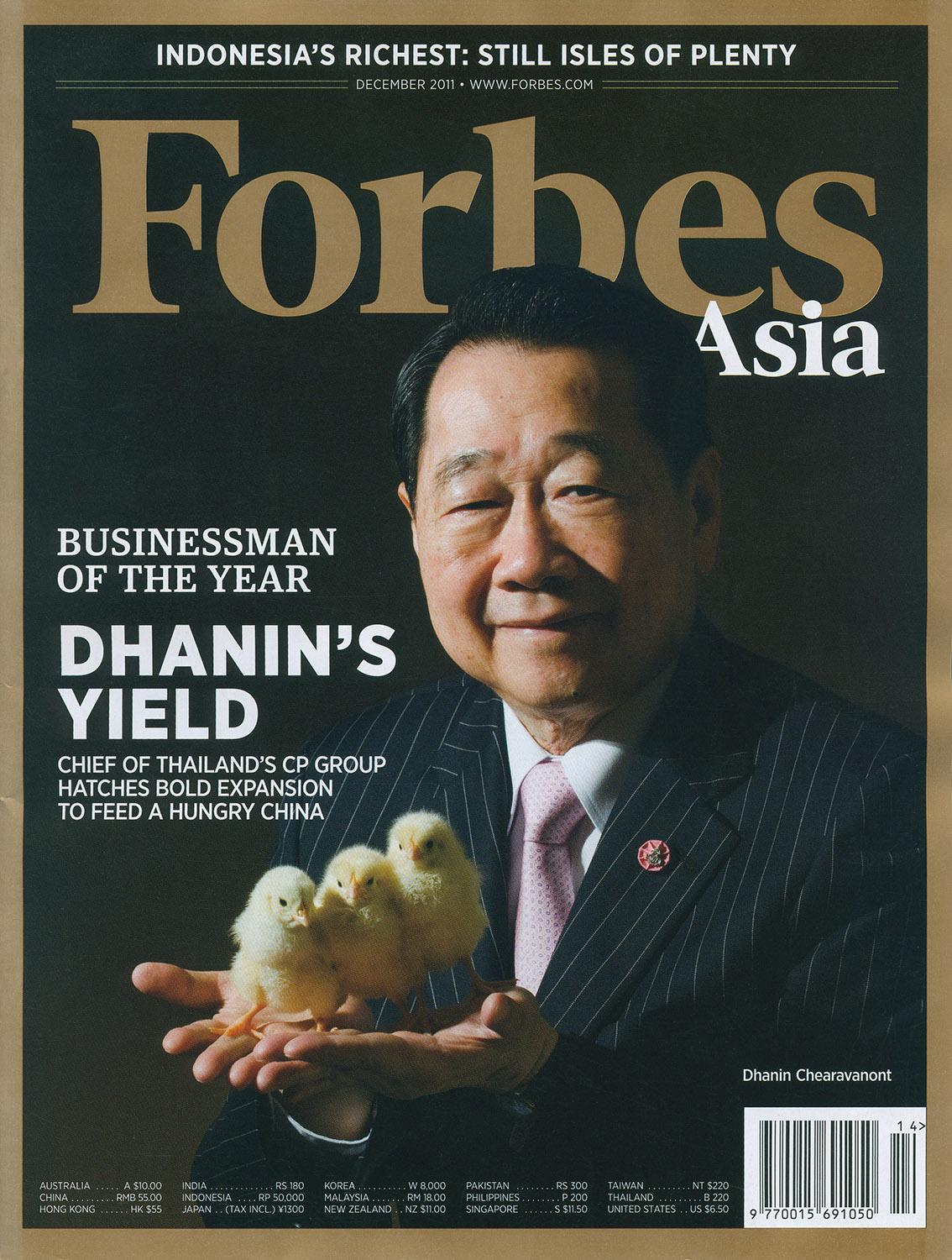 Cover of Forbes magazine featuring Businessman of the Year, Dhanin Chearavanont, Chairman and CEO of Charoen Pokphand Group (Thailand), holding three chicks.