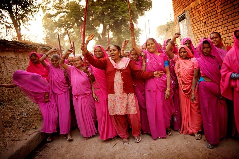 Members of the gang walk around the village, proclaiming the presense of Gulabi Gang. The Gulabi gang, or “the pink gang” (a direct translation from Hindi), is a group of women who have decided to take justice into their own hands. Photo and story by Jonas Gratzer