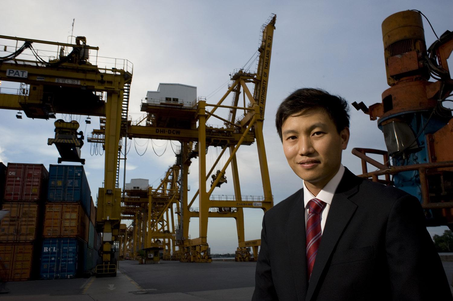 All photos in this article taken by Peter Charlesworth with off-camera Nikon and/or Vivitar flash units. Portraits of Chalermchai Mahagitsiri, CEO of the PM Group Company Limited at the main cargo port in Khlong Toei Bangkok.