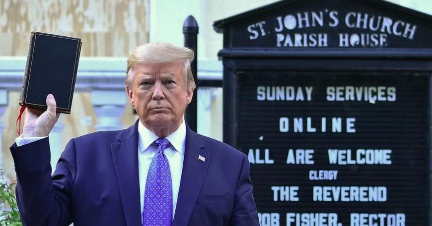 A screen grab of President Trump holding up a bible in front of a church as he vows to get tough on protesters.
