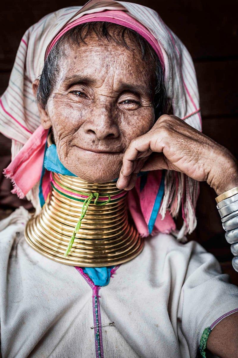 Portrait of a Padaung woman in her house. Photo and story credits by Jorge Fernández Garcia.